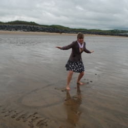 Becky surfing on the beach